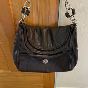 Calvin Klein chocolate brown folder over bag